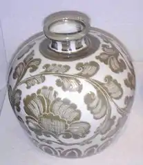 Song dynasty porcelain bottle with iron pigment over transparent colorless glaze, 11th century, Chinese