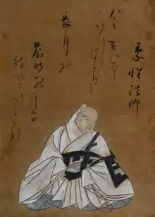 A Japanese monk in a ceremonial white robe