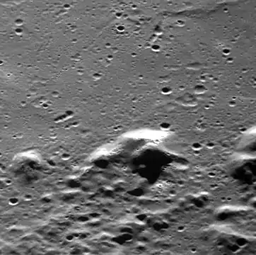 Hollows on a mountain peak within Sousa crater