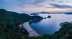 Overview of beach at sunset, looking towards the south-west