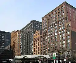 The Manhattan Building (right) is the oldest surviving skyscraper in the world to use a purely skeletal supporting structure.