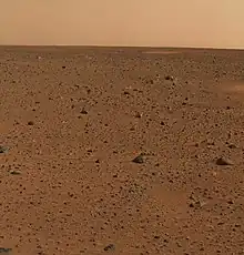 First color picture from Gusev crater.  Rocks were found to be basalt.  Everything was covered with a fine dust that Spirit determined was magnetic because of the mineral magnetite.