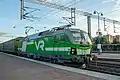 A Finnish Vectron Sr3 3301 at Kerava station in 2021. Note hump on the roof, lack of front air intakes and SA3 coupler