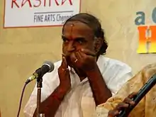 Srirangam Kannan playing the morsing (jaw harp) in a carnatic music concert.