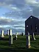 View of the St. Raphael's ruins and surrounding gravestones