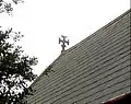 Bell gable cross now on chancel roof