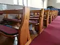 Pews designed by Barber (re-varnished)