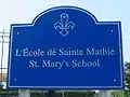 Bilingual school sign