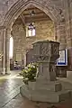 Baptismal font looking towards the south porch and aisle