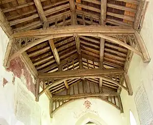 The 15th-century tie-beam roof