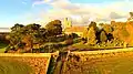 View of site of St Patrick's Church including part of the graveyard & main entrance to the churchyard.