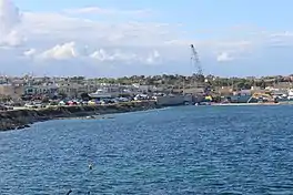 A photograph of St Thomas bay taken from the Munxar Headland