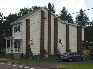 Buttresses to support the wall of this row house were constructed after its neighboring house was taken down as part of the Centralia mine fire.