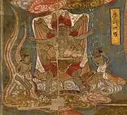 Māhākala holding up an elephant skin and standing on a snake. Detail of a painting found in the Mogao Caves in Dunhuang, Gansu, China