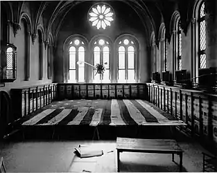 #42 (24/9/1877)The original Star-Spangled Banner flag undergoing restoration work in 1914 in the West Wing of the Smithsonian Institution Building, under the hanging giant squid model, one of the few exhibits not removed for the occasion (see also photograph showing seamstresses at work under the guidance of Amelia Fowler)