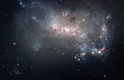 The galaxy NGC 4449 is currently a global starburst, with star formation activity widespread throughout the galaxy.