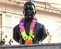 A bust of Mathema built in memory of him.