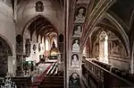 Interior of the Gothic Lutheran church in Štítnik with Gothic frescoes