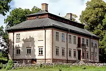 A Swedish Sateri is hipped and pent-hipped with two layers of eaves