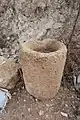 A stone mortar unearthed at archaeological site in Israel