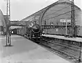 NS 3601 with wagons along the platform of Amsterdam Central. (1932)