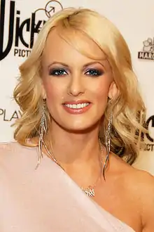 Stormy Daniels smiling at the camera