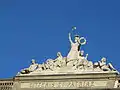 The Palace's motto on top of the avant-corps