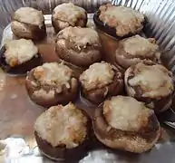 Close-up view of cooked stuffed mushrooms