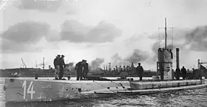 Image 32The German submarine U-14 arriving in port. Photo credit: Photographer unknown, image scanned from a public domain text by the Great War Primary Documents Archive.