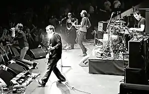 Suede performing at the Royal Albert Hall, March 2010From left to right: Brett Anderson, Richard Oakes, Neil Codling, Mat Osman and Simon Gilbert.