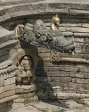 Bhagiratha beneath the main spout of Sundhara, Kathmandu, Nepal