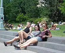 Image 183Women in casuals relaxing at a park in USA, 2010 (from 2010s in fashion)