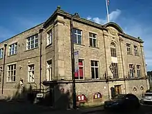 Photograph showing the entrance to the gallery in the Sunny Bank Mills complex, a textile mill dating to the early 19th century, in Farsley, Leeds.