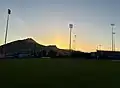 Bishop Peak in San Luis Obispo is visible behind the right-field stands of Cal Poly's Baggett Stadium.