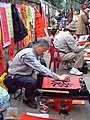 Write calligraphy on Tết Nguyên Đán in Hanoi