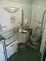 Universal access toilet in car 634-12