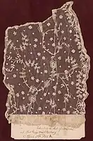 A piece of lace with accompanying handwritten note: "Taken from the hand of a dead rebel at Fort Gregg near Petersburg, April 2nd, 1865" (Liljenquist collection, Library of Congress)