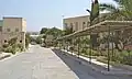 View looking down hill towards school hall and admin block