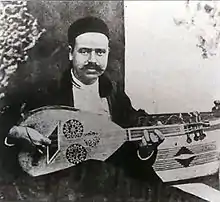 Khemaïs Tarnane playing with oud.