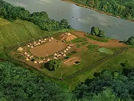 Image 15Artist's conception of the Taskigi Site, a fortified mound and village near Wetumpka, Alabama (from History of Alabama)