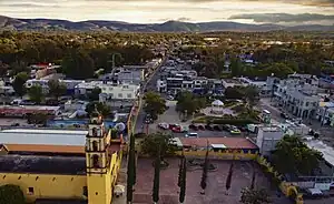 Tasqullio seen from an aerial view with the Parroquia San Bernardino de Siena seen on the left