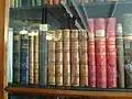 The collected works of Pushkin (in brown leather bindings)  in Tchaikovsky's bookcase.  They were the source of his operas Eugene Onegin and The Queen of Spades.