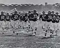 Parsons College football team taking the field at dedication game, October 8, 1966 vs. Los Angeles State