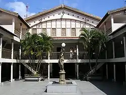 Fountain in courtyard surrounded by building