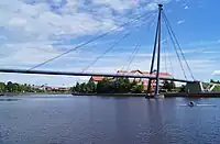 A rower under the Teesquay Millennium Bridge