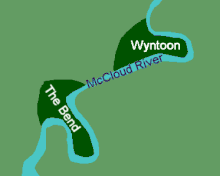 Map diagram showing two neighboring plots of land each bordered by a sharp bend in a river.