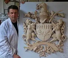 Carved coat of arms.