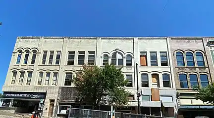 The 1901 Romanesque Revival Dudley Building once had a turret inspired by the chimney stacks of Chambord.