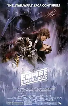 This poster shows a montage of scenes from the movie. Dominating the background is the dark visage of Darth Vader; in the foreground, Luke Skywalker sits astride a tauntaun; Han Solo and Princess Leia gaze at each other while in a romantic embrace; Chewbacca, R2-D2, and C-3PO round out the montage.