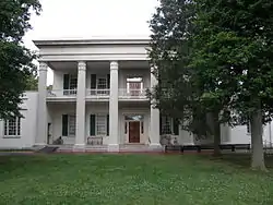 Oblique front photograph of the Hermitage, showing the false-front architectural style.